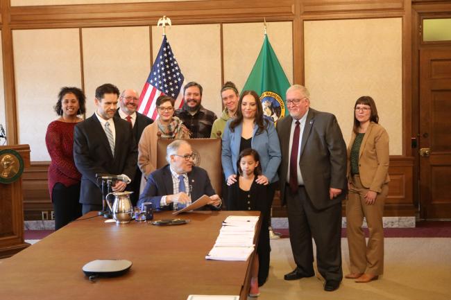 Photo of governor Inslee and residents